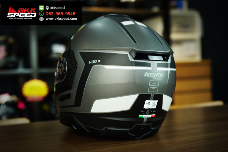 รูปสินค้าหมวกกันน็อคเต็มใบ แบรนด์ Nolan รุ่น Nolan N90.3 ลาย/สี N90.3 Reflector Flat Black Lava Grey (34) ECE R22.06 สำหรับขี่มอเตอร์ไซค์ มุมด้านหลัง จาก BKKSPEED