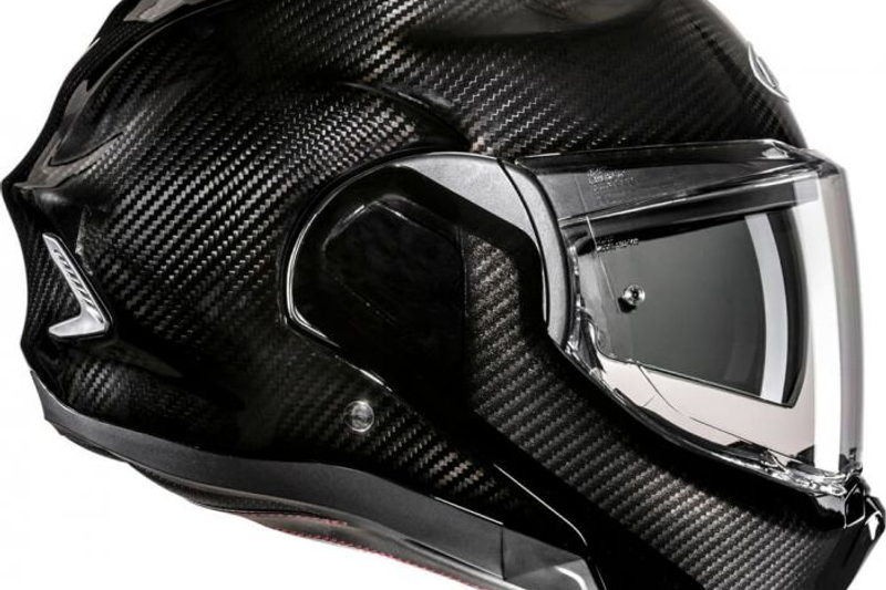 รูปสินค้าหมวกกันน็อคเต็มใบ แบรนด์ HJC รุ่น F100 ลาย/สี Carbon Flipback สำหรับขี่มอเตอร์ไซค์ มุมด้านหลัง จาก BKKSPEED